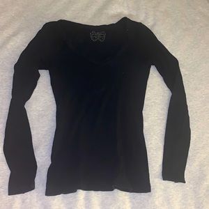 Black long sleeve shirt. Small. V cut in front